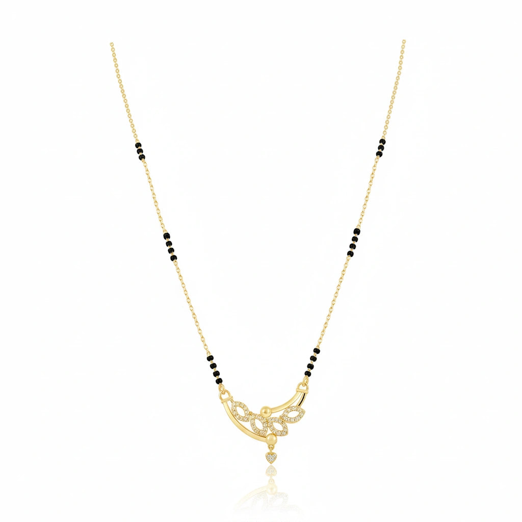 Short fancy gold mangalsutra with black bead chain and diamond-studded floral scroll pendant with heart drop on white background