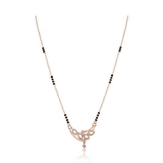 Short fancy rose gold mangalsutra with black bead chain and diamond-studded floral scroll pendant with heart drop on white background